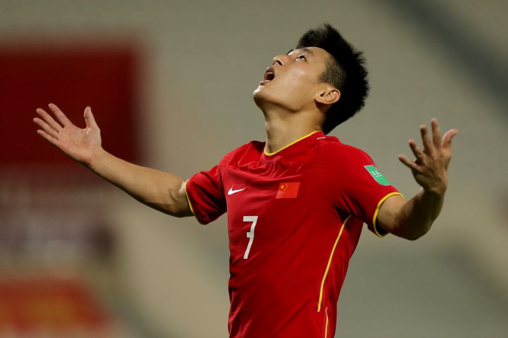 中国队球员武磊庆祝进球。新华社发
