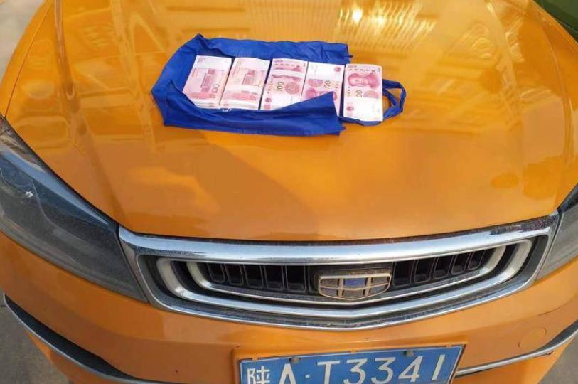 粗心乘客丢失5万元现金 热心的哥忙送还